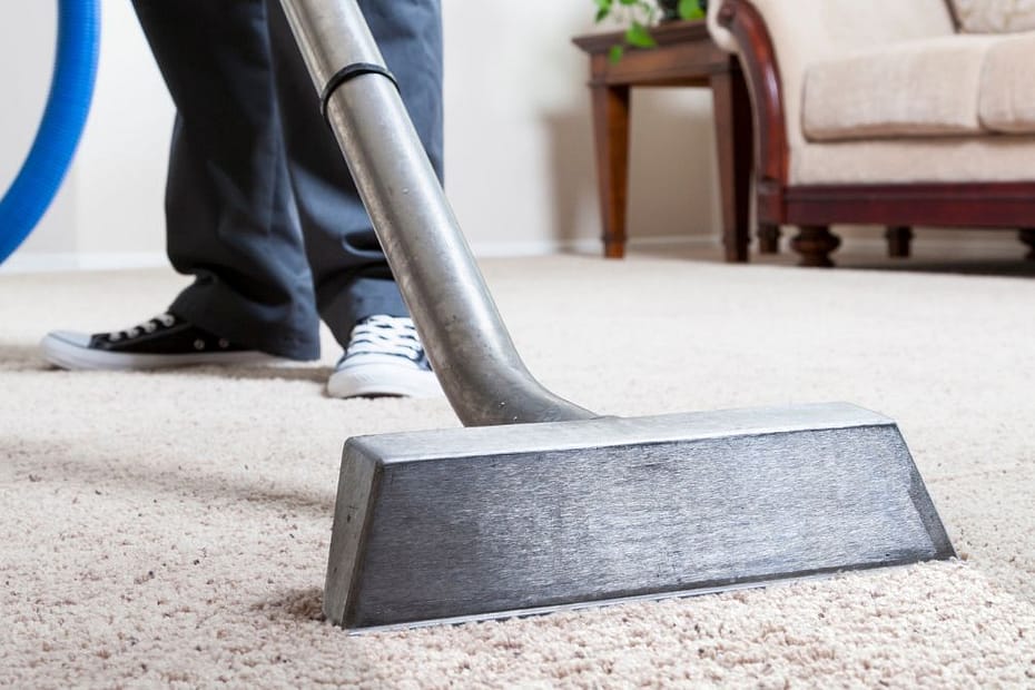 A Boy Cleaning carpet