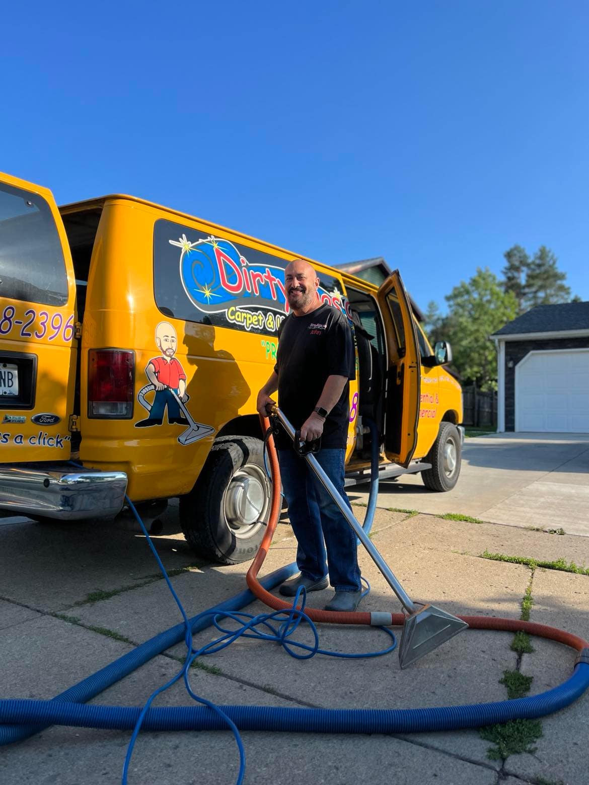 11.30 2 John Rotolo Holding Steam Cleaner